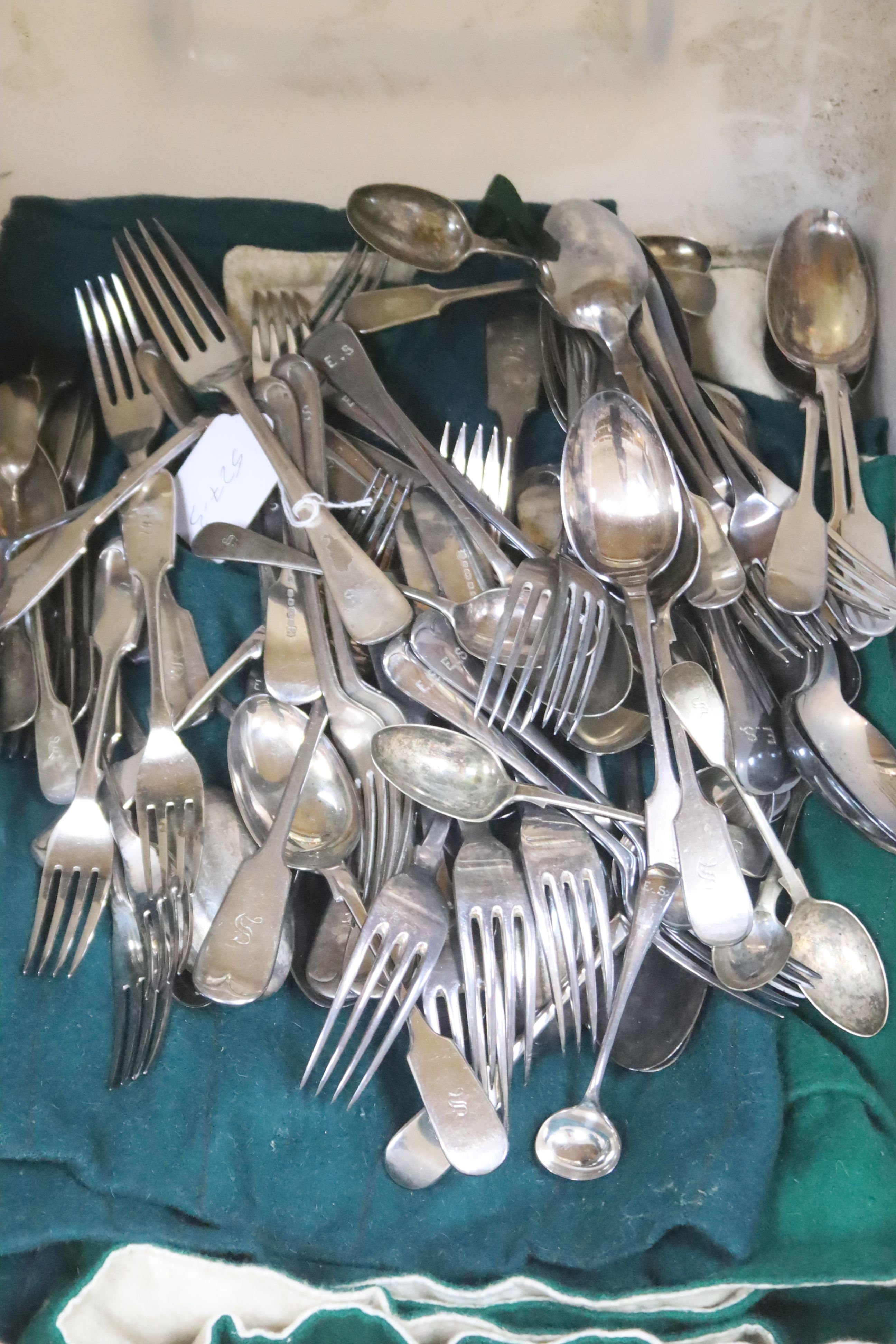 A quantity of assorted plated flatware including fiddle and Old English pattern, most initialled.